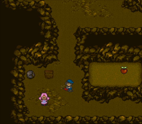 Nina searching for herbs inside mountain cave
